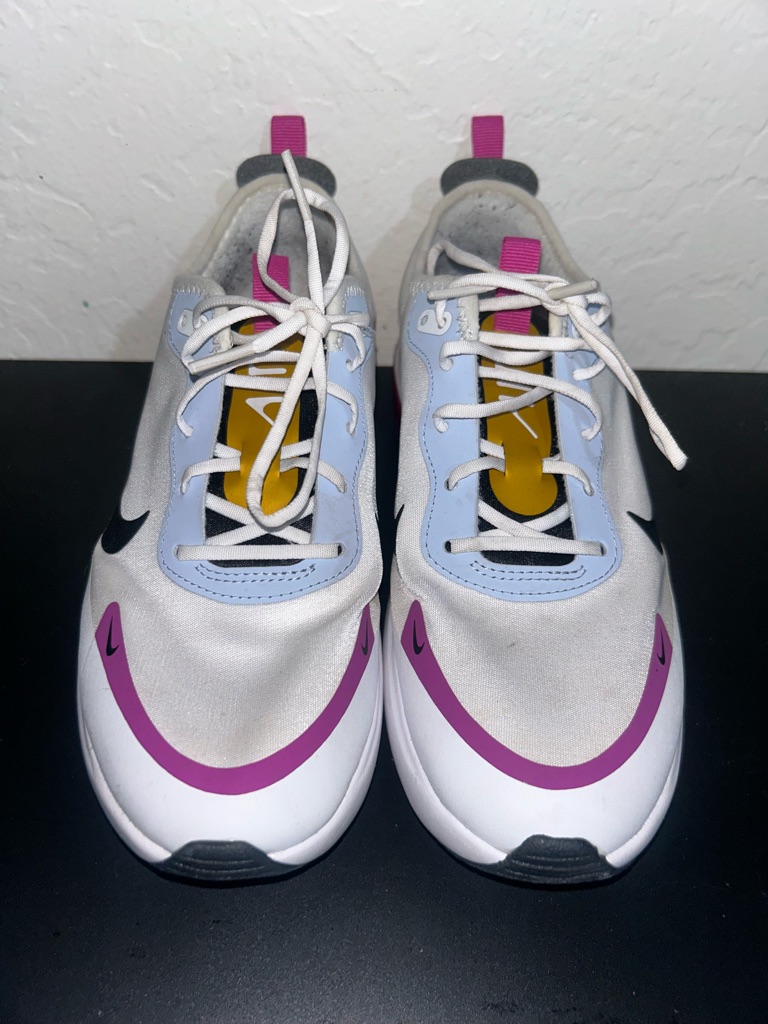 Nike Women’s White Sneakers With Purple & Yellow Accents